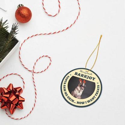 Custom photo christmas ornament laid flat on a table showing the personalized design and print quality