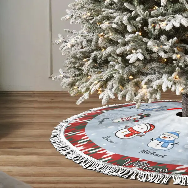 Custom Christmas tree skirt featuring personalized family icons and names, perfect for adding charm to your holiday décor.