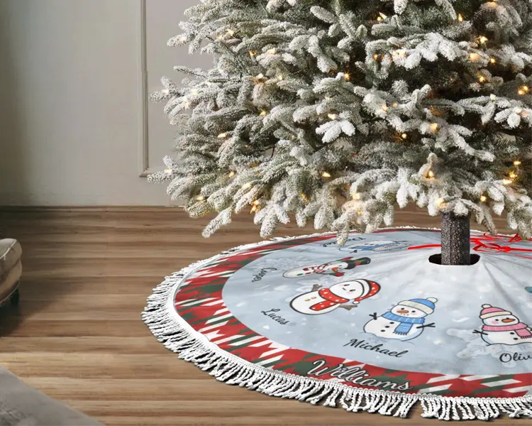 Custom Christmas tree skirt featuring personalized family icons and names, perfect for adding charm to your holiday décor.