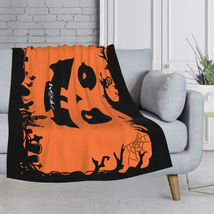Custom Halloween blanket with pumpkin face design and personalized name, perfect for decorating living room sofa.